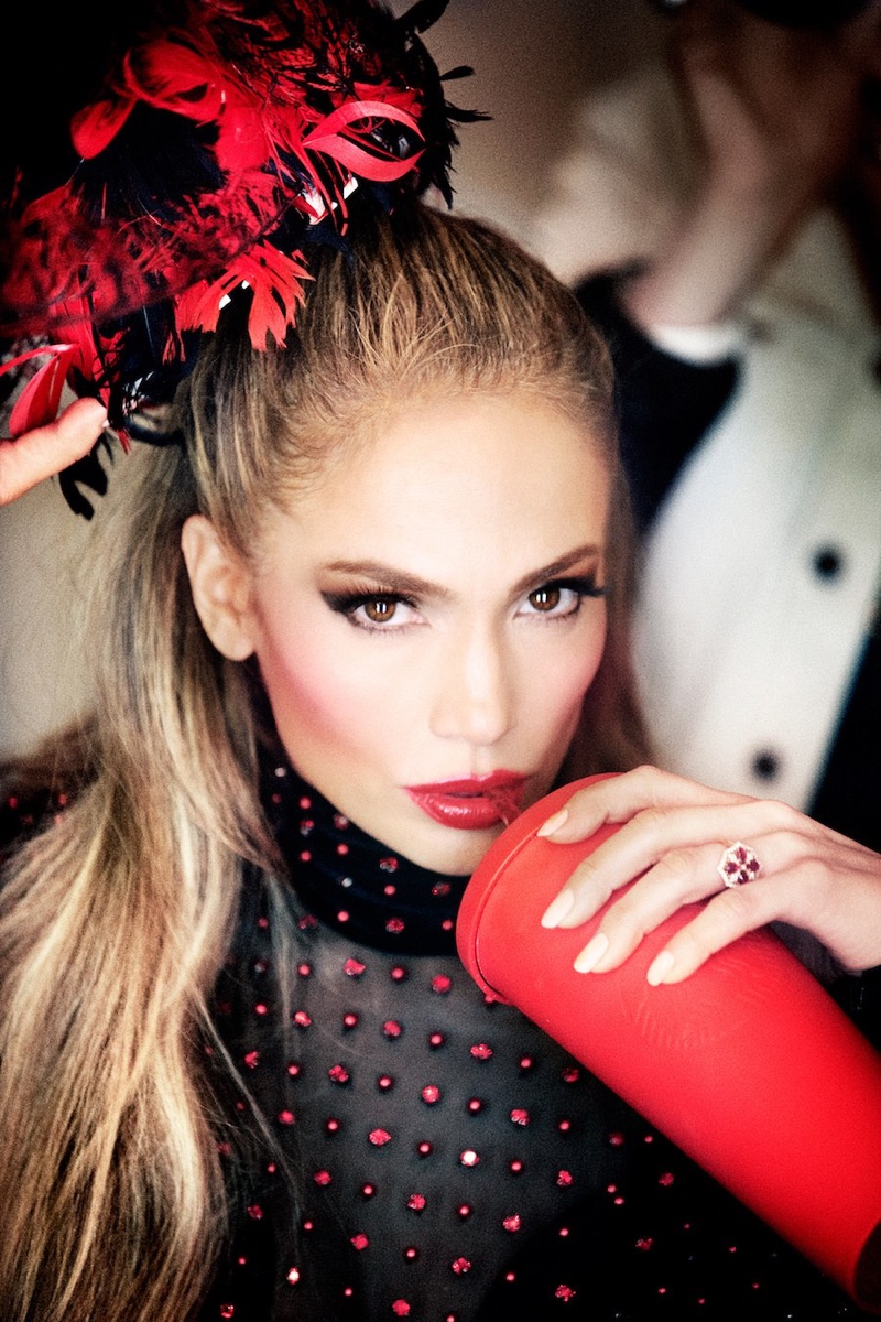 Showing off a red lip, Jennifer Lopez poses in The Blonds embellished bodysuit 