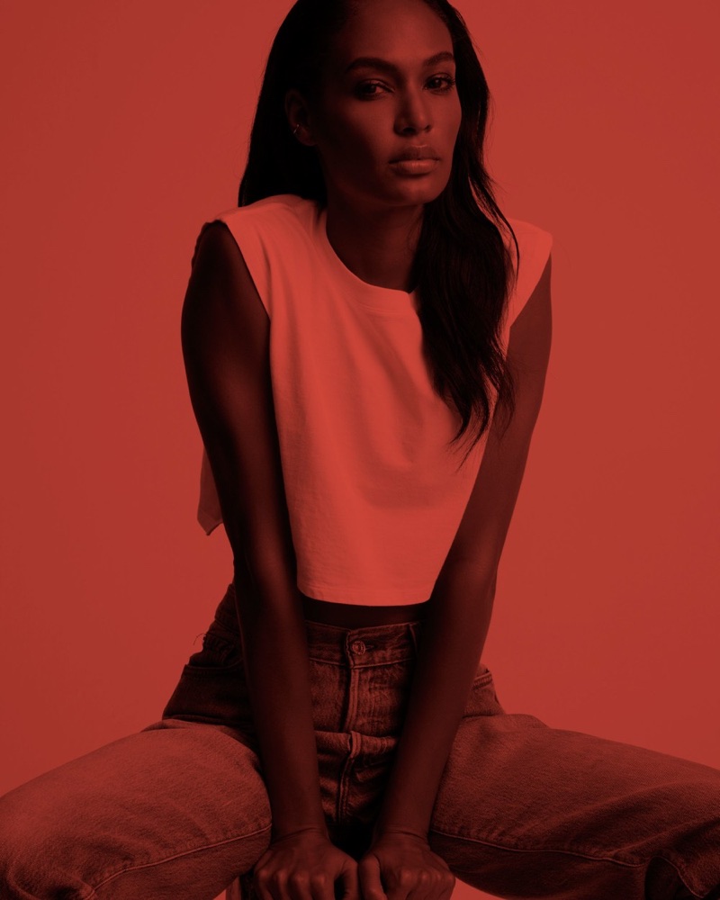 Model Joan Smalls poses in a white tee for Hanes x karla campaign