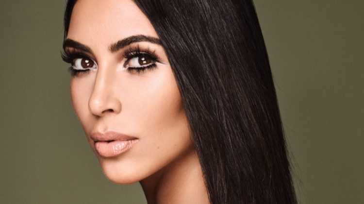 Wearing a long and straight hairstyle, Kim Kardashian poses in Dilek Hanif dress