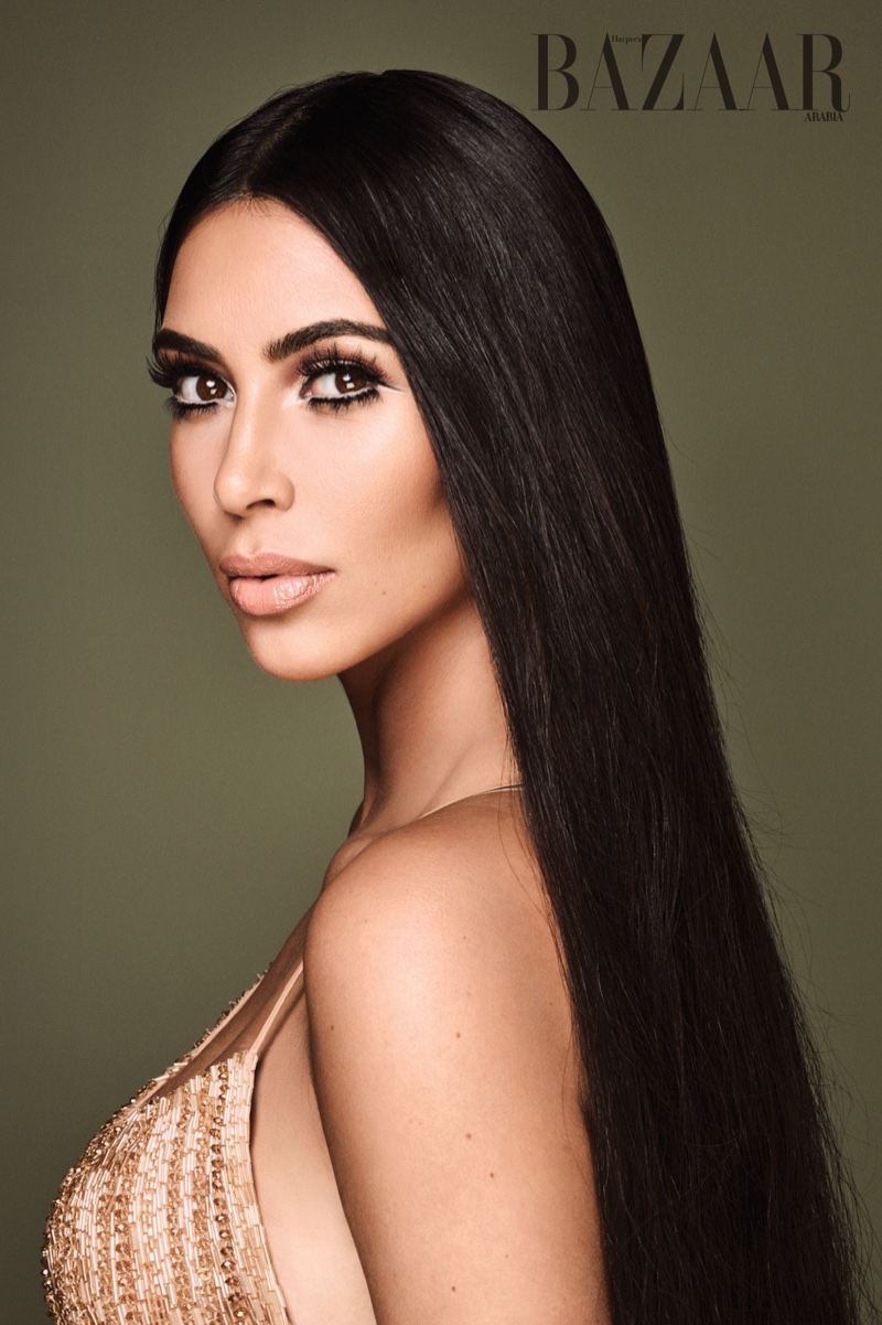 Wearing a long and straight hairstyle, Kim Kardashian poses in Dilek Hanif dress