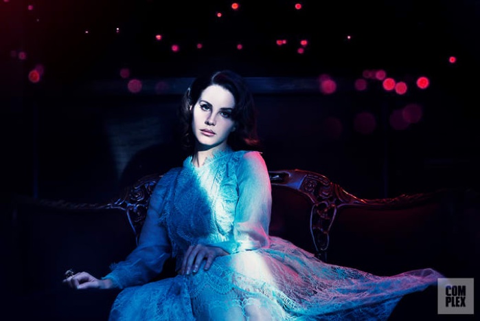 Embracing lace, Lana Del Rey poses in Maria Lucia Hohan dress