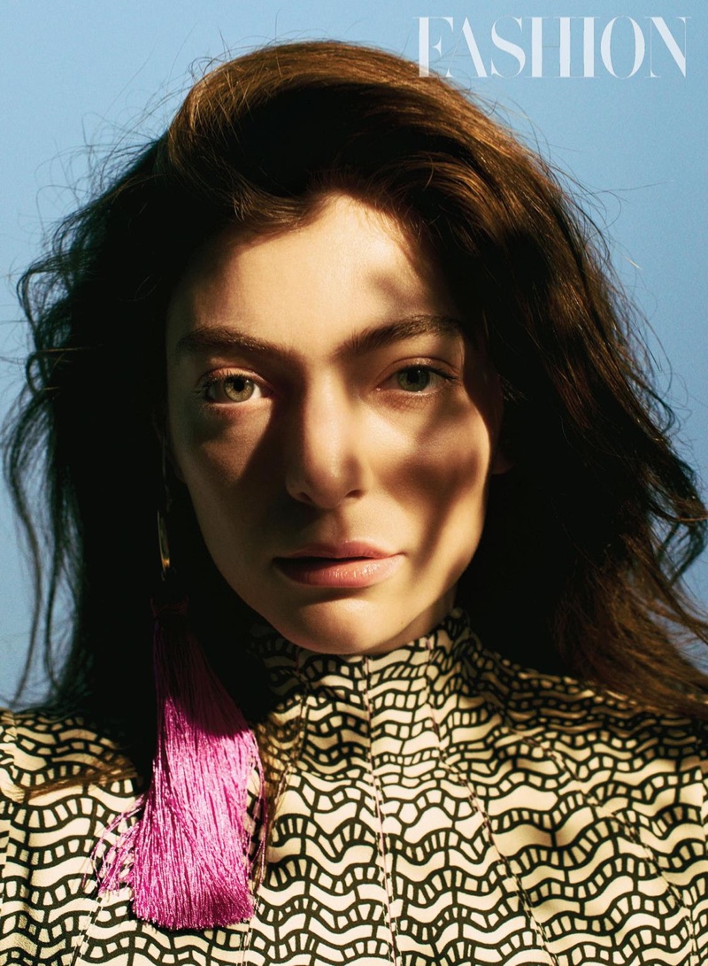 Getting her closeup, Lorde wears Valentino dress and Haarstick Jewelry earrings