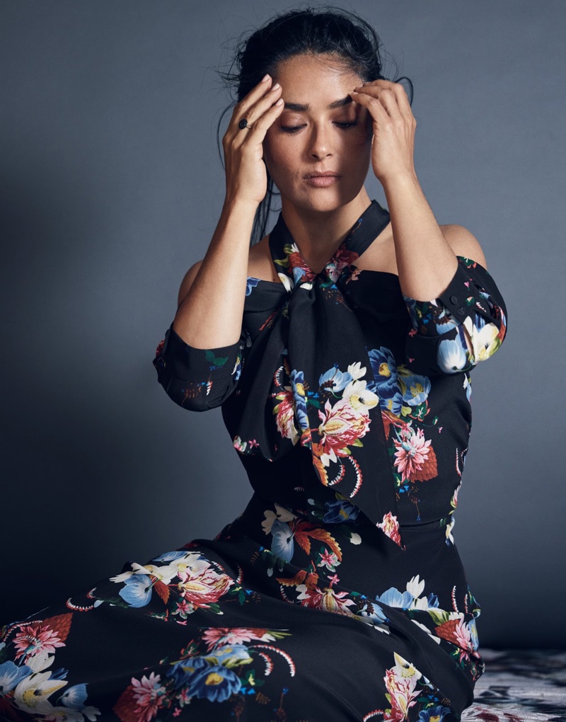 Flaunting some shoulder, Salma Hayek poses in Erdem floral print dress