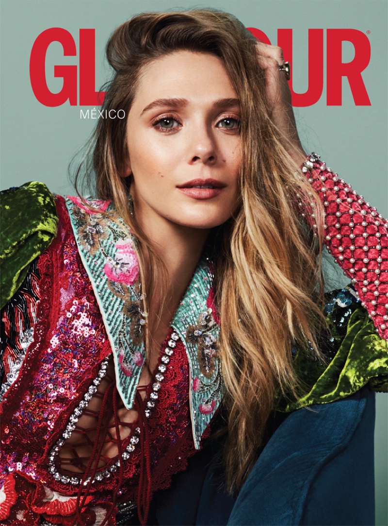 Actress Elizabeth Olsen wears a multicolored jacket