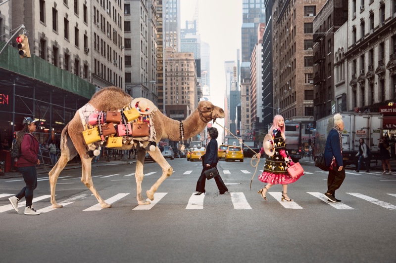 Fernanda Ly walks in New York with a camel for Kate Spade's spring-summer 2017 campaign