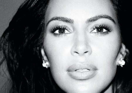 Kim Kardashian is Ready for Her Close-Up in Allure Kim Kardashian models Elizabeth Lock earrings