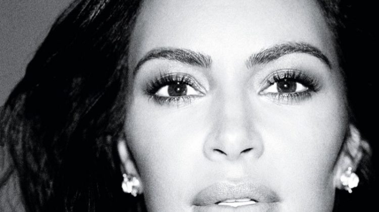 Kim Kardashian models Elizabeth Lock earrings