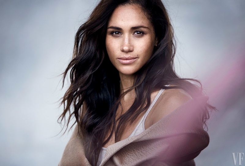 Actress Meghan Markle wears her hair in tousled waves