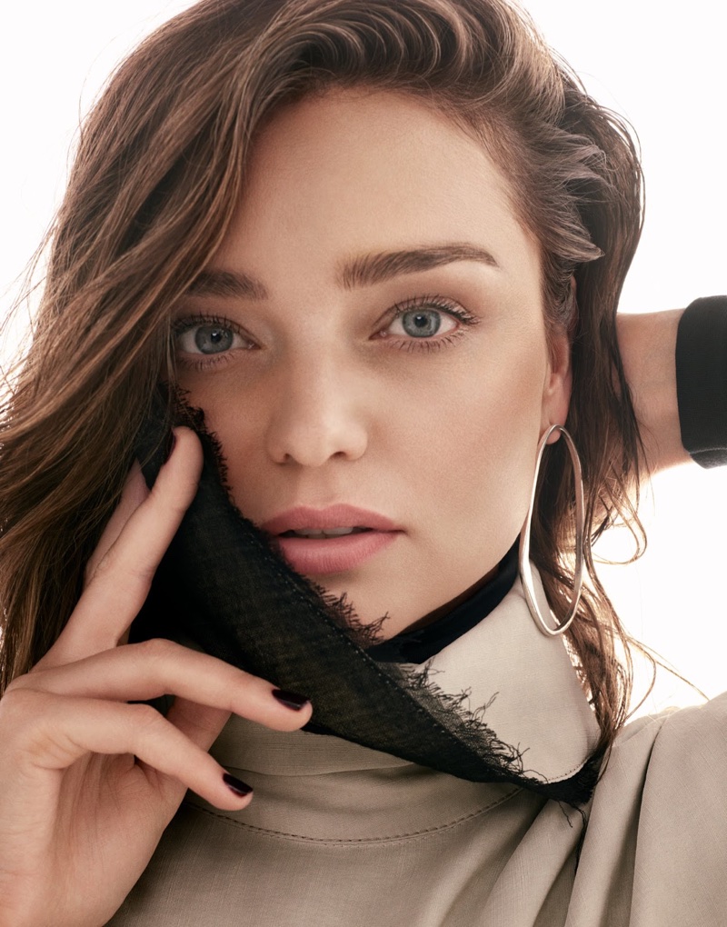 Getting her closeup, Miranda Kerr poses in an Acne Studios dress