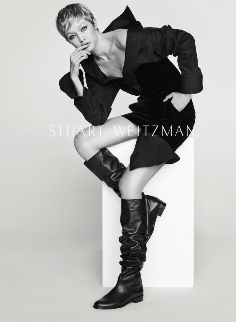 Model Gigi Hadid wears a knee-high boot in Stuart Weitzman's fall-winter 2017 campaign