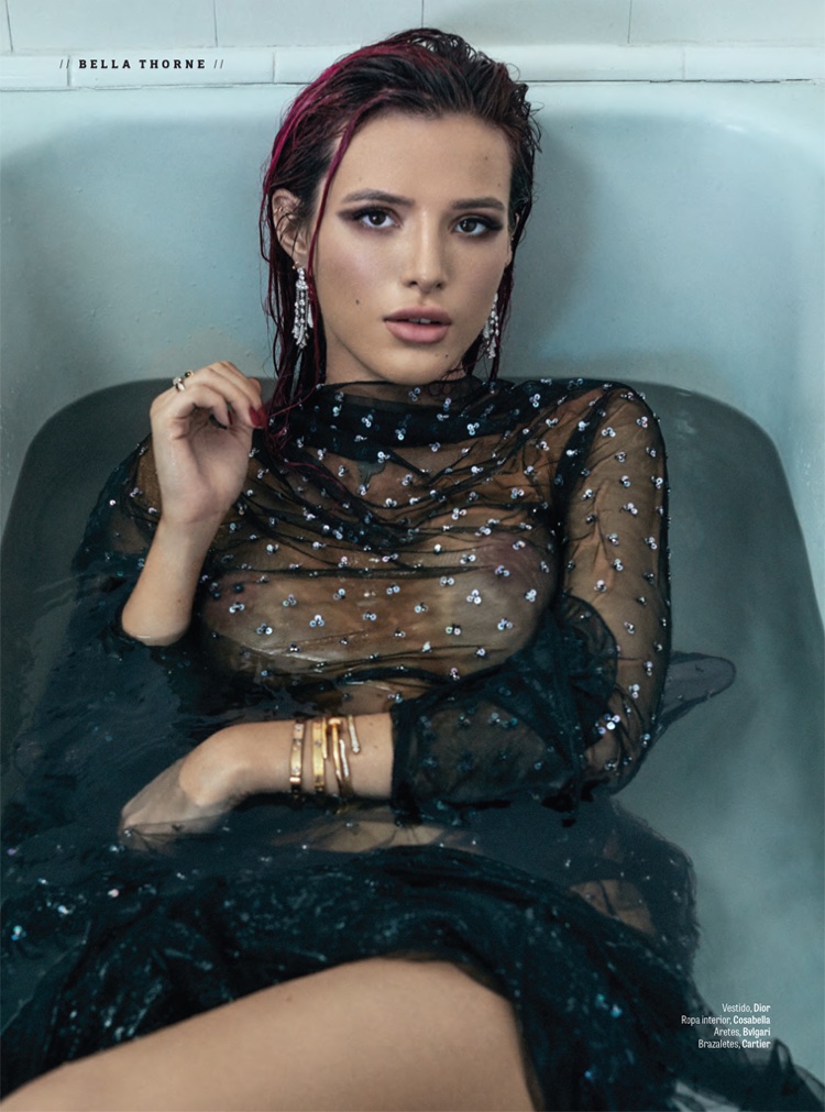 Posing in a tub, Bella Thorne wears sheer Dior dress