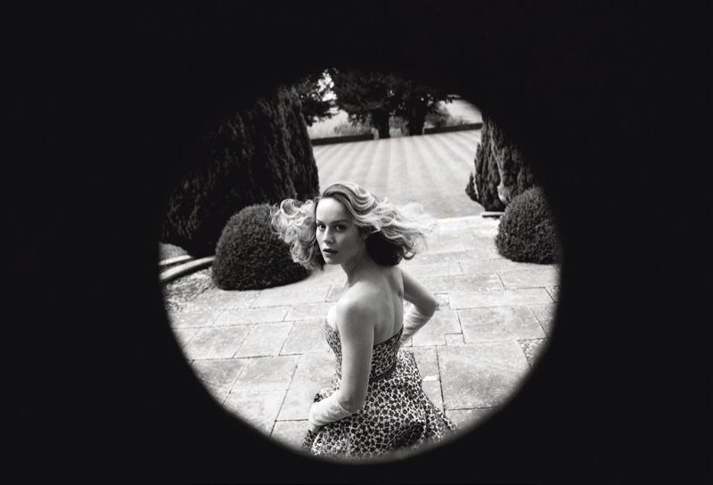 Photographed in black and white, Brie Larson poses in Oscar de la Renta dress