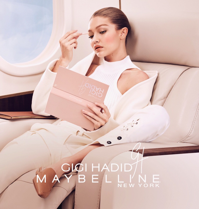 Gigi Hadid poses with GigixMaybelline Jetsetter palette