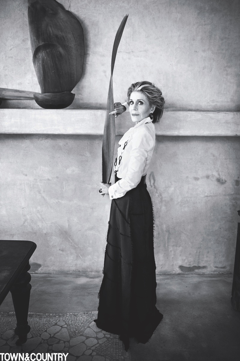 Photographed in black and white, Jane Fonda wears Ralph Lauren Collection shirt, The Row skirt and Vhernier necklace