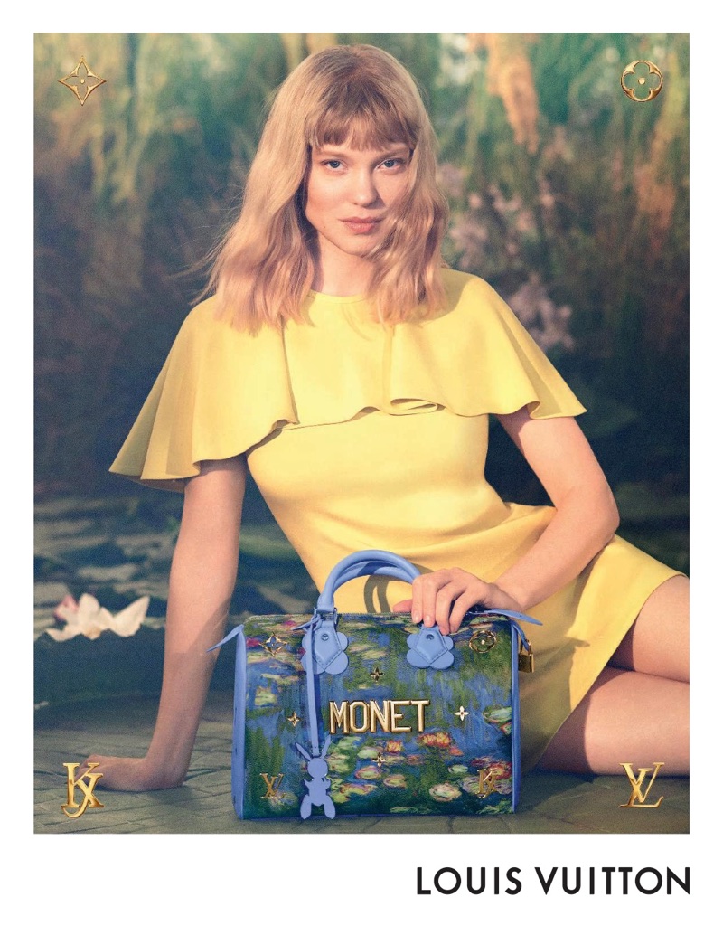Actress Lea Seydoux poses with Monet handbag from Louis Vuitton x Jeff Koons collaboration