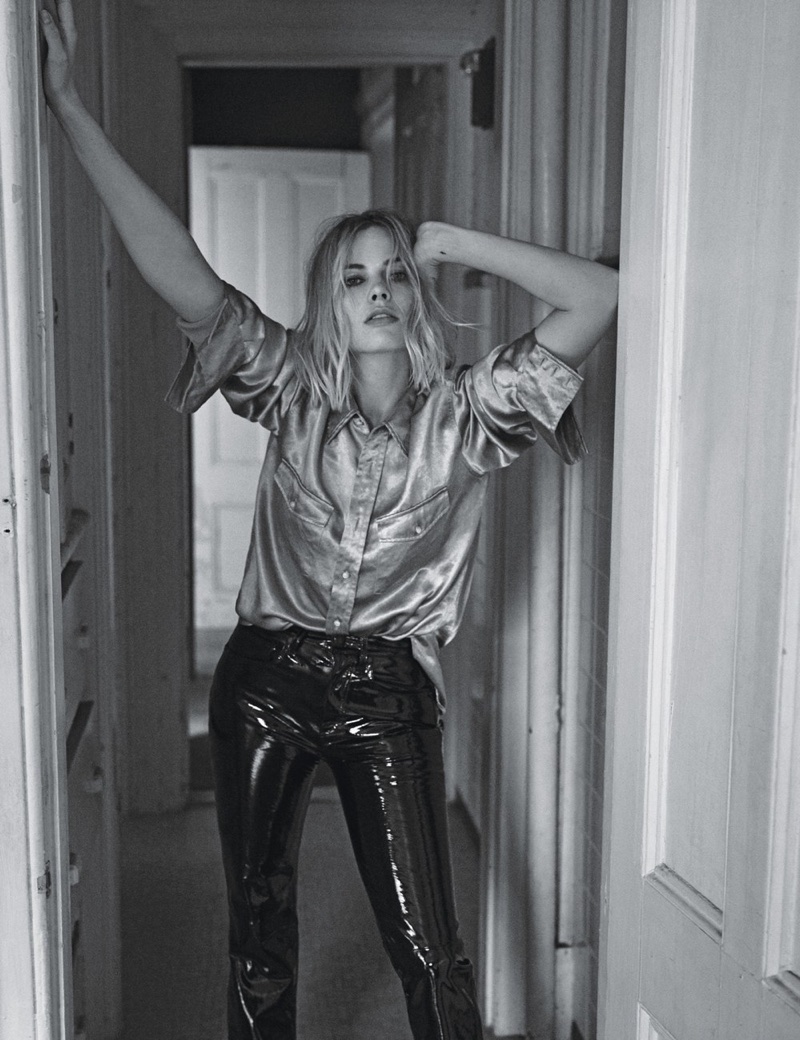 Striking a pose, Margot Robbie wears Gucci shirt and Rag & Bone trousers