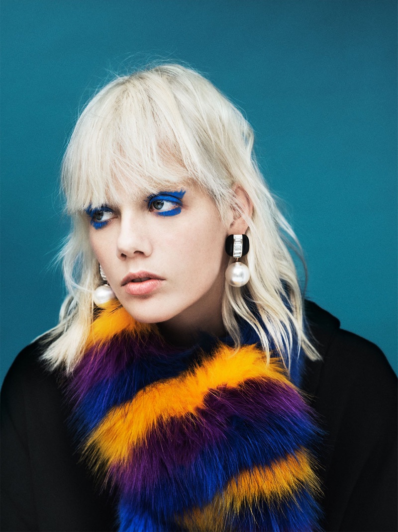 Marjan Zonkman wears Zara Large Faux Pearl Earrings and Faux Fur Stole with Multicolored Stripes