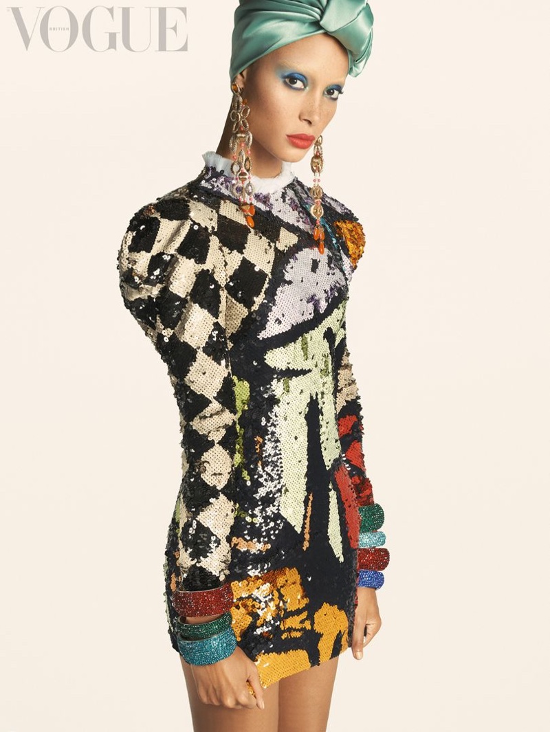 Adwoa Aboah wears sequined dress with puffed sleeves. Photo: Steven Meisel/Vogue UK