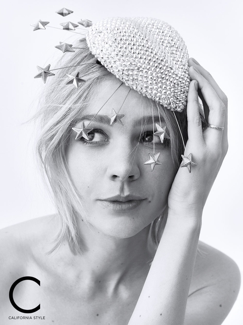 Actress Carey Mulligan poses in embellished Gucci headpiece