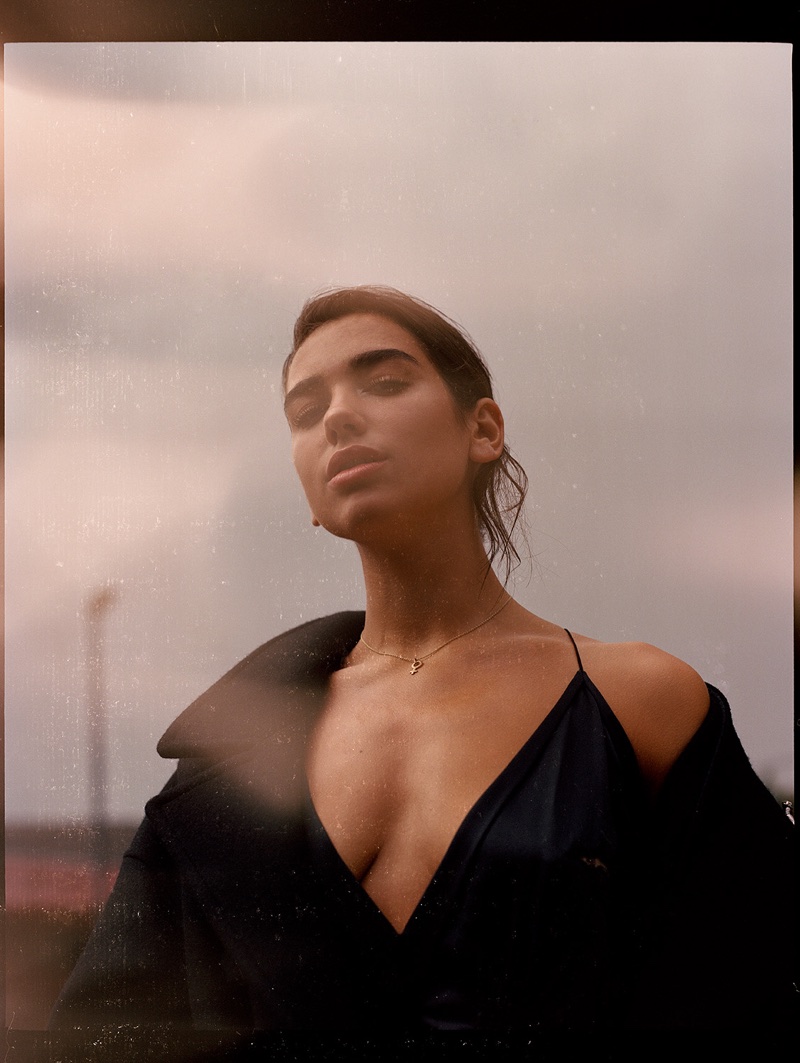 Dua Lipa wears Saint Laurent dress and coat