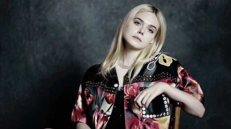 Actress Elle Fanning poses in Miu Miu jacket and dress