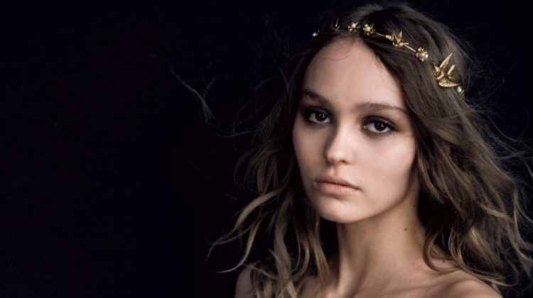Turning up the shine factor, Lily-Rose Depp poses in Chanel metallic bodice