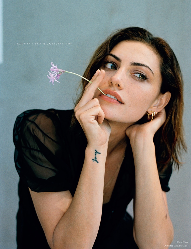 Showing off her tattoo, Phoebe Tonkin poses in Chloe dress