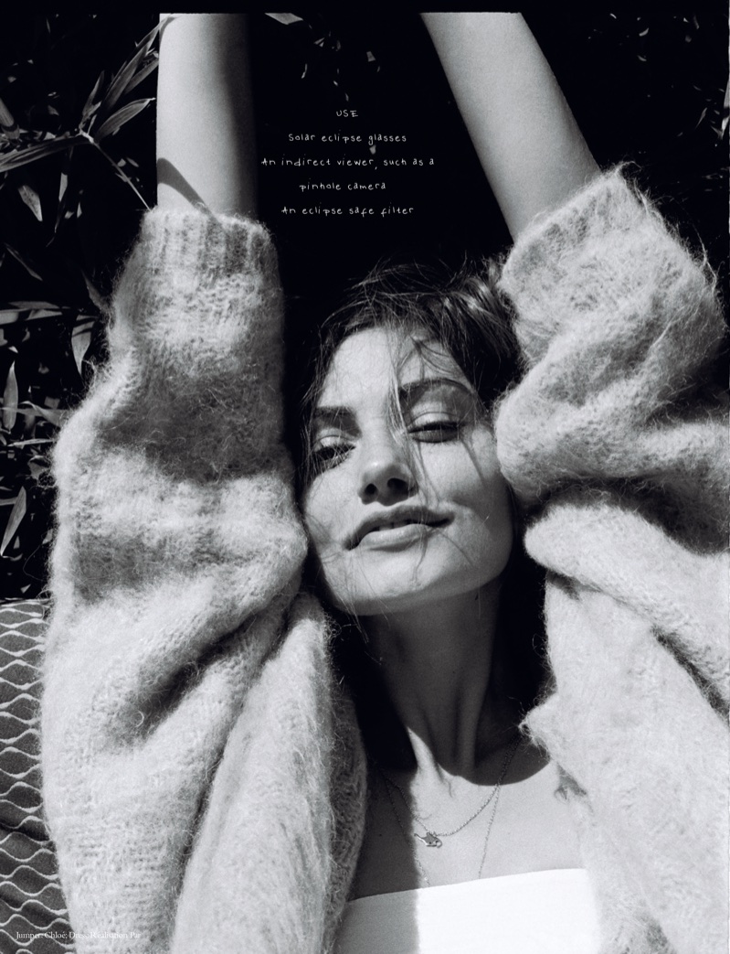 Phoebe Tonkin poses in Chloe sweater and Realisation Par dress