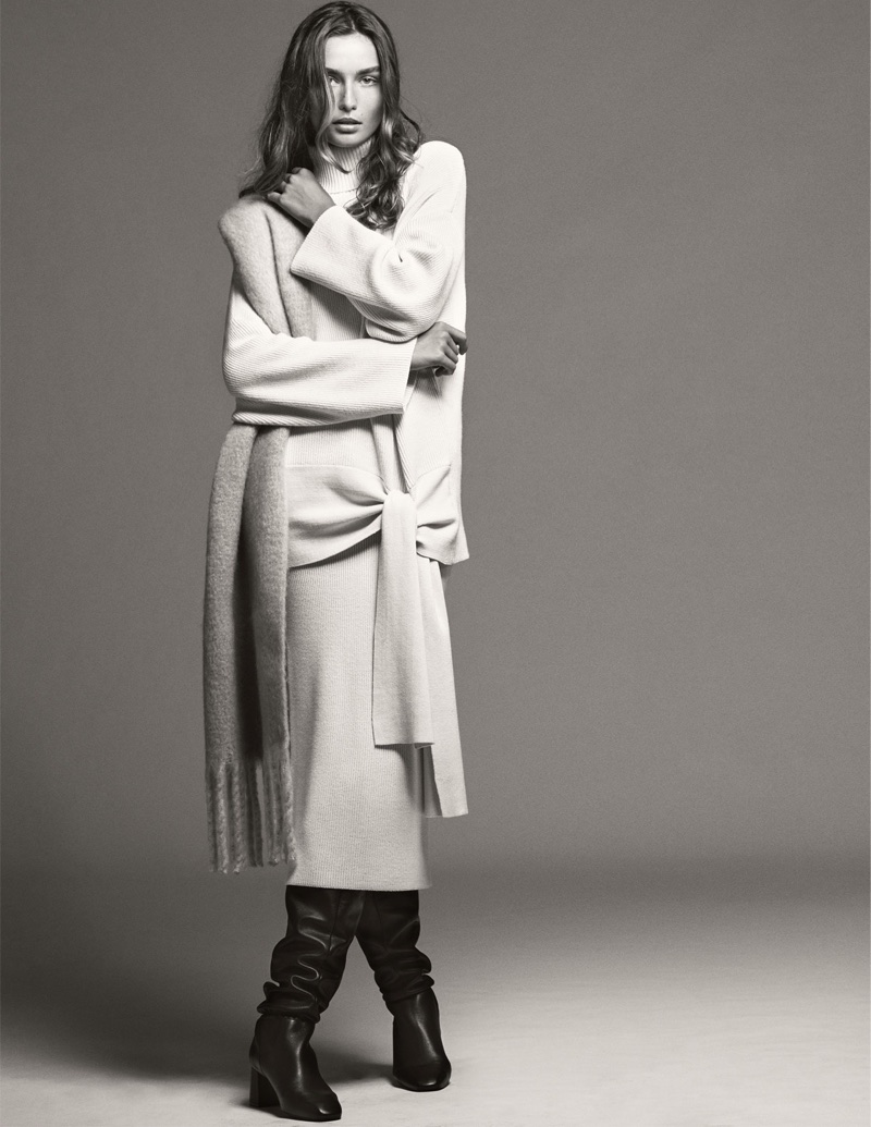 Andreea Diaconu models Zara sweater with bow, ribbed skirt and leather boots with gathering