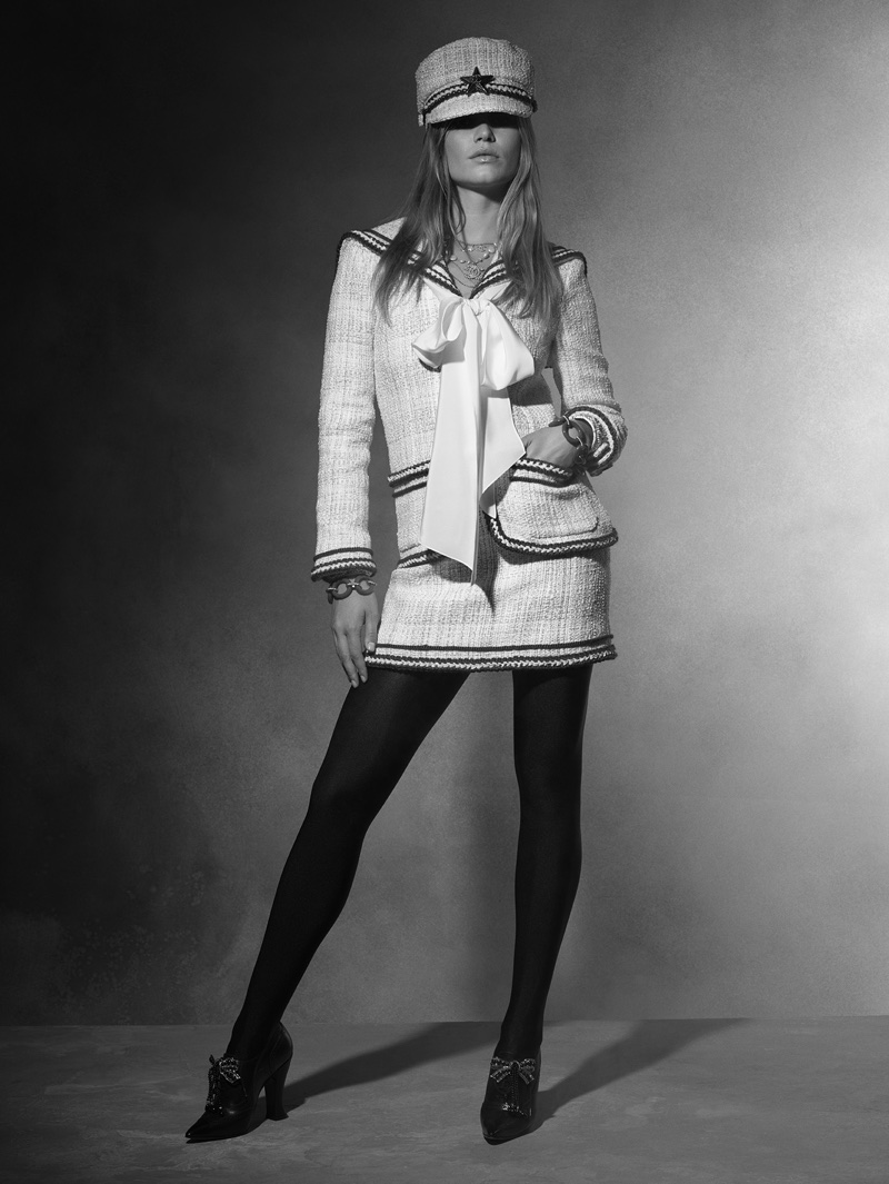 Anna Ewers wears Chanel tweed skirt suit from Chanel's pre-fall 2018 collection