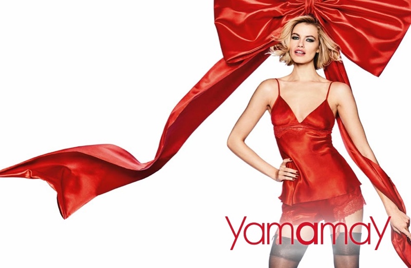 Model Hailey Clauson poses in red camisole for Yamamay's Christmas 2017 campaign