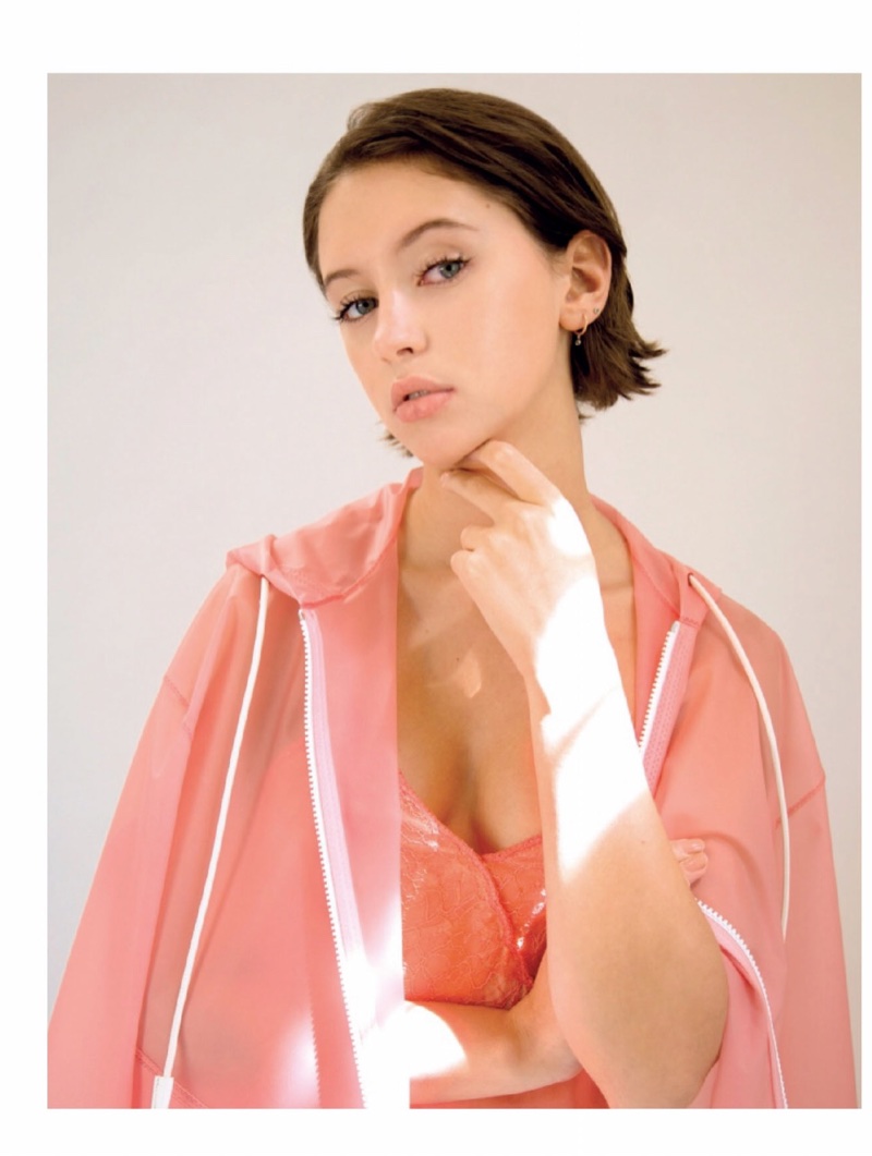 Dressed in pink, Iris Law wears Burberry jacket and dress