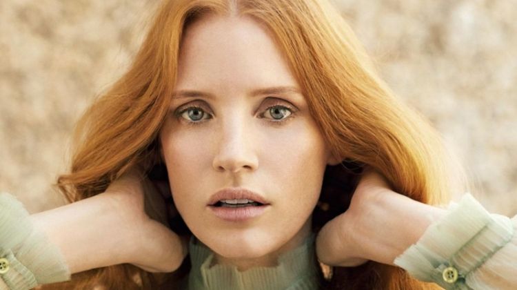 Jessica Chastain poses in high-neck Prada top
