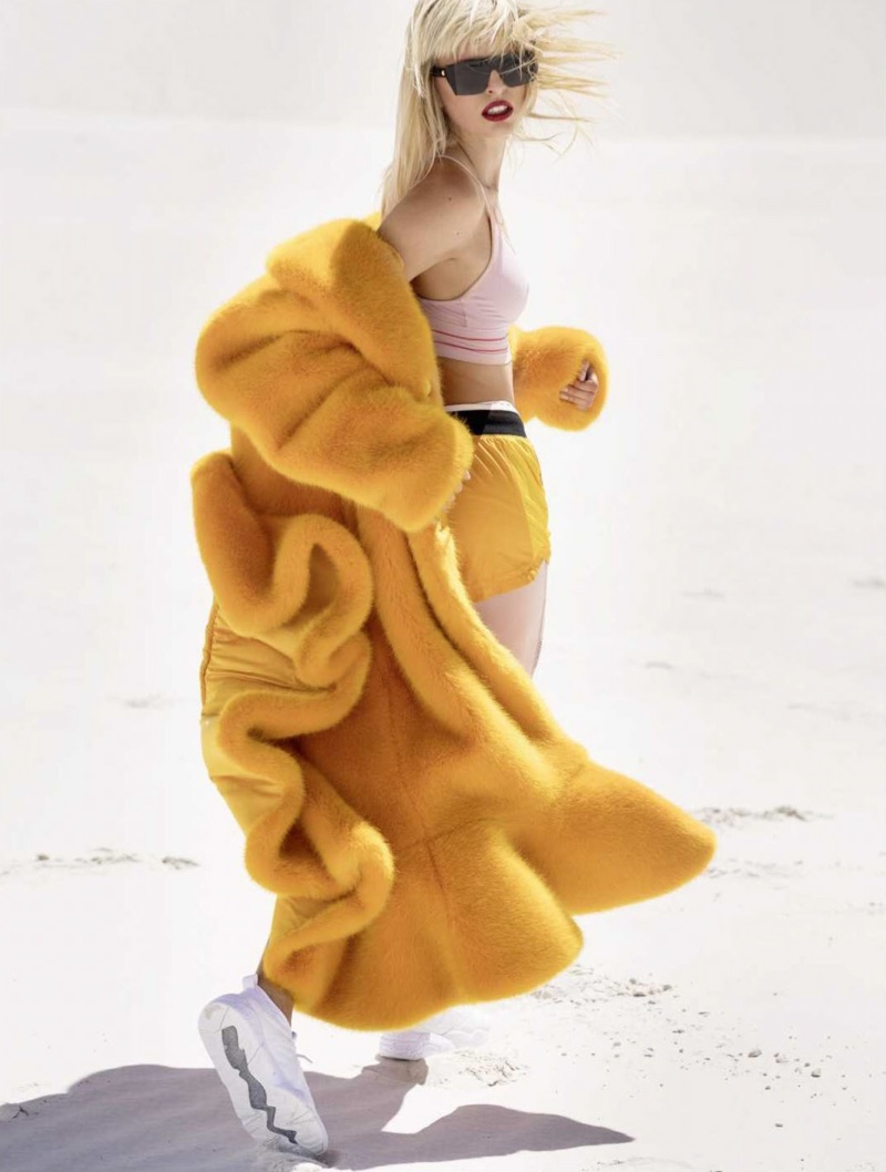 Karolina Kurkova Models Colorful Coats for ELLE Russia