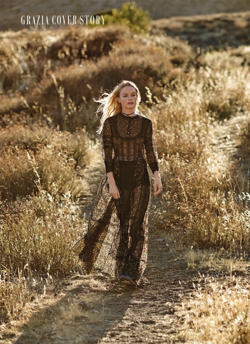 Actress Kate Bosworth poses in Dior dress, briefs and boots