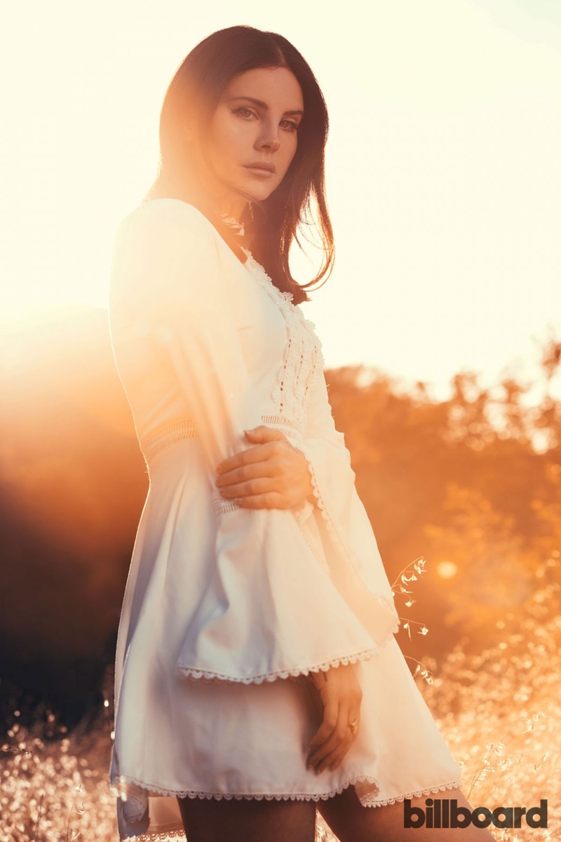 Looking bohemian glam, Lana Del Rey wears white dress