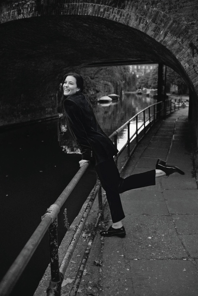 Embracing a simple look, Liv Tyler wears jacket, pants and oxfords