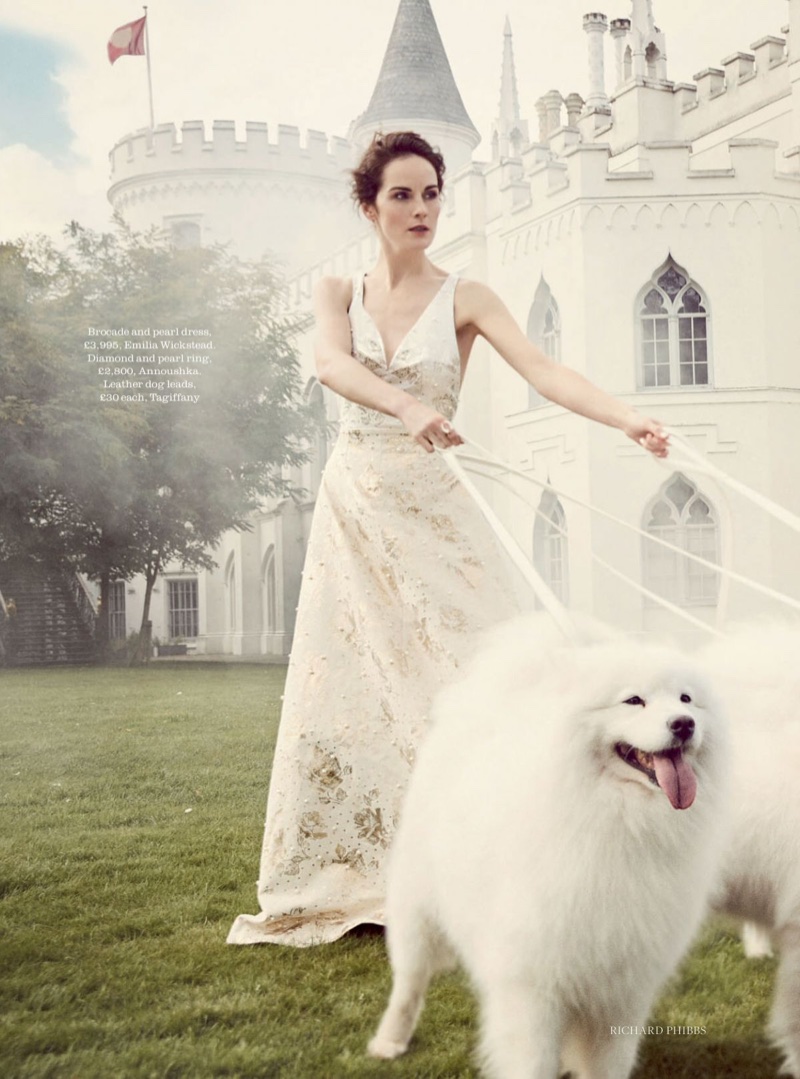 Posing with dogs, Michelle Dockery wears Emilia Wickstead brocade and pearl dress
