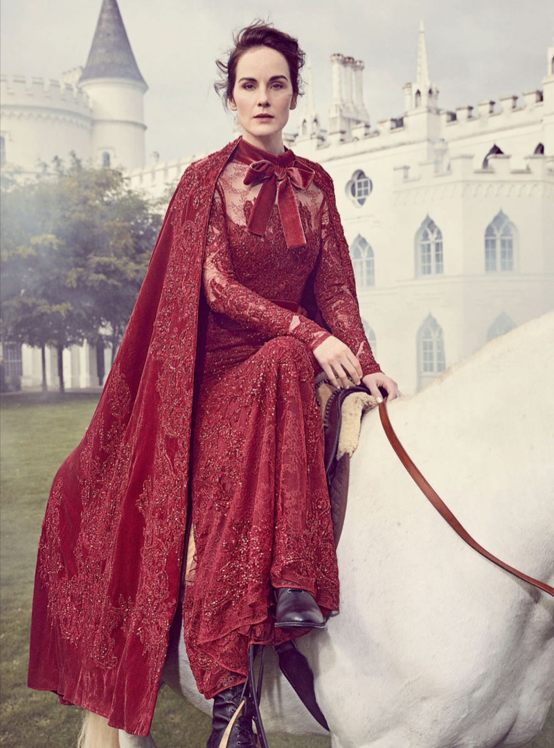 On a horse, Michelle Dockery poses in Elie Saab Haute Couture embroidered dress and cape