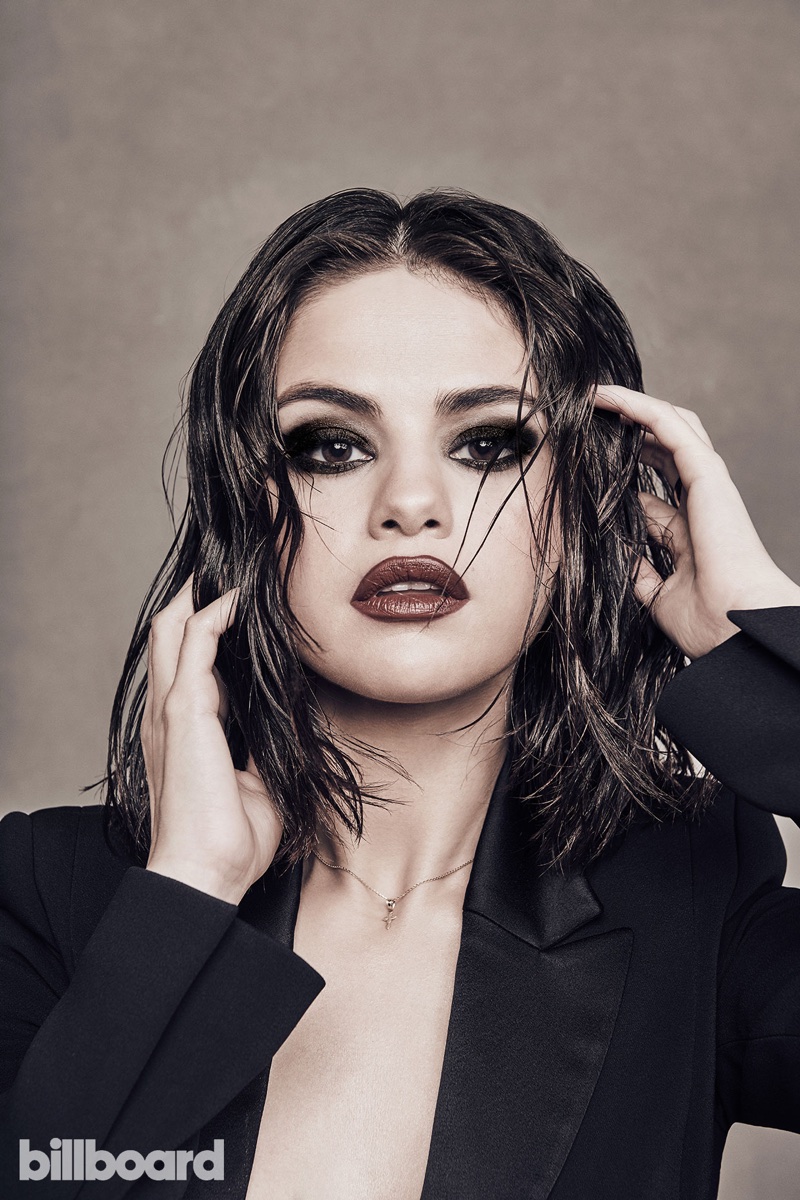 Selena Gomez wears smokey eyeshadow with dark lip color