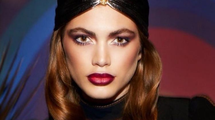 Model Valentina Sampaio wears a bold red lip color from Marc Jacobs Beauty