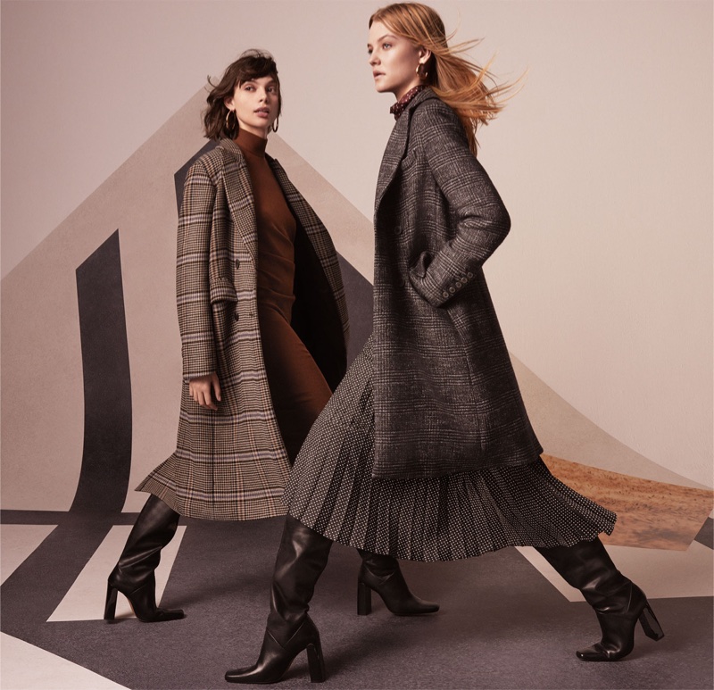 Charlee Fraser and Roos Abels pose in winter outerwear from Zara