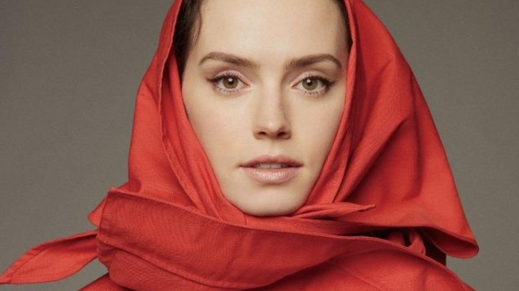 Actress Daisy Ridley poses in red Balenciaga coat
