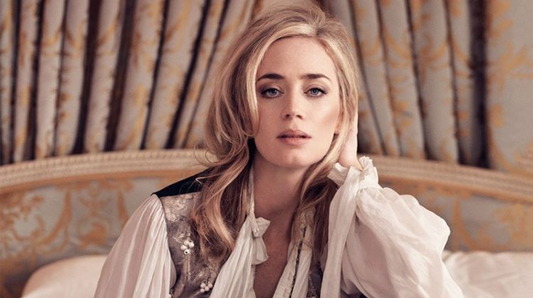 Posing in bed, Emily Blunt wears Louis Vuitton vest and blouse