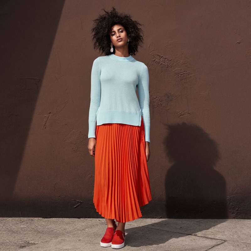 H&M Fine-Knit Sweater, Pleated Skirt, Slip-On Shoes and Large Earrings