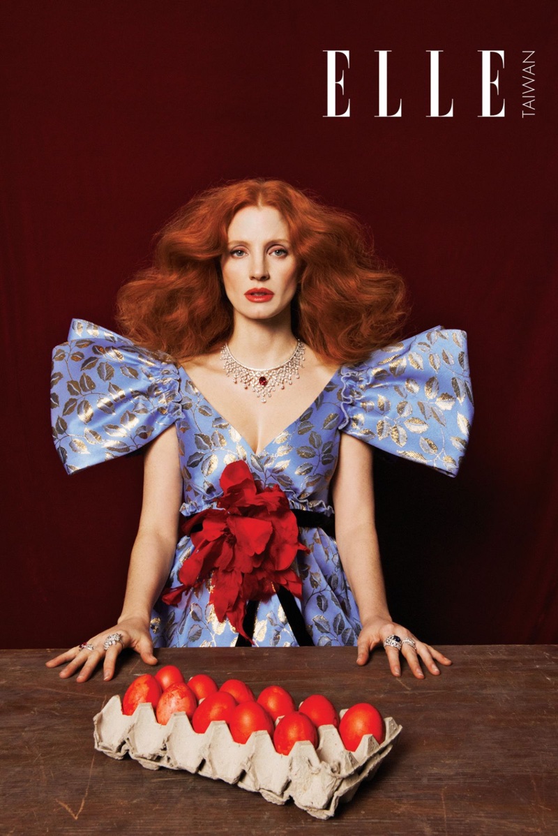 Actress Jessica Chastain poses in embroidered Gucci dress
