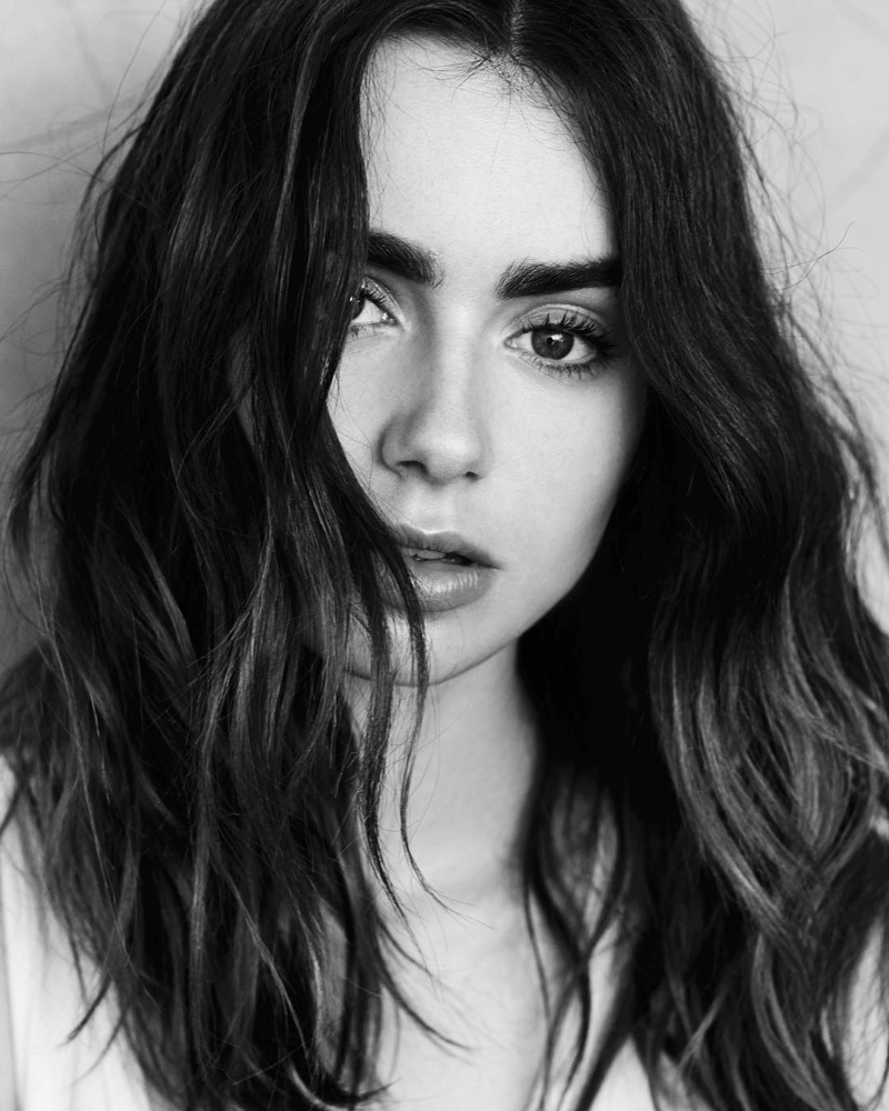Showing off a wavy hairstyle, Lily Collins stuns in this shot