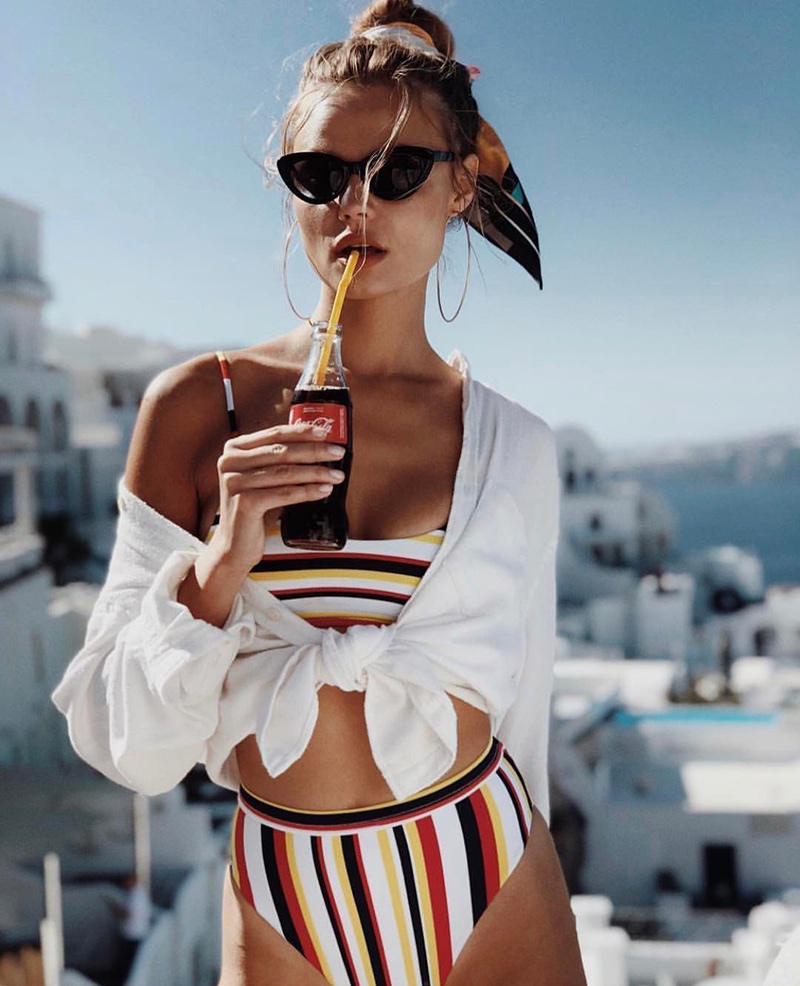 Magdalena Frackowiak models striped swimsuit set in Bikini Lovers' spring-summer 2018 campaign