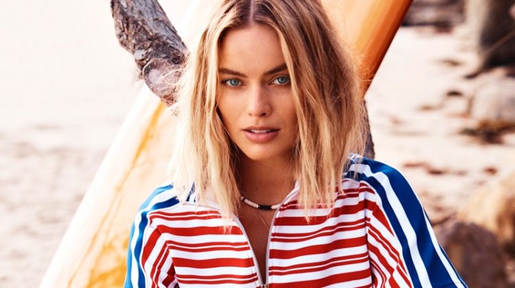 Actress Margot Robbie poses in Louis Vuitton printed top and shirt with Teva sandals