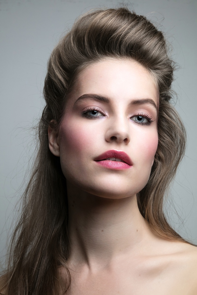 Model Noah Steenbruggen poses with half up, half down hairstyle. Photo: Jeff Tse